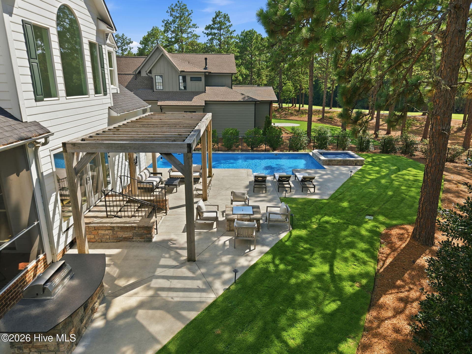 Rear exterior and pool - 102 Chesterfield Drive, Pinehurst, NC 28374