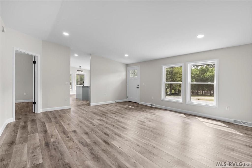 Living room flows to kitchen