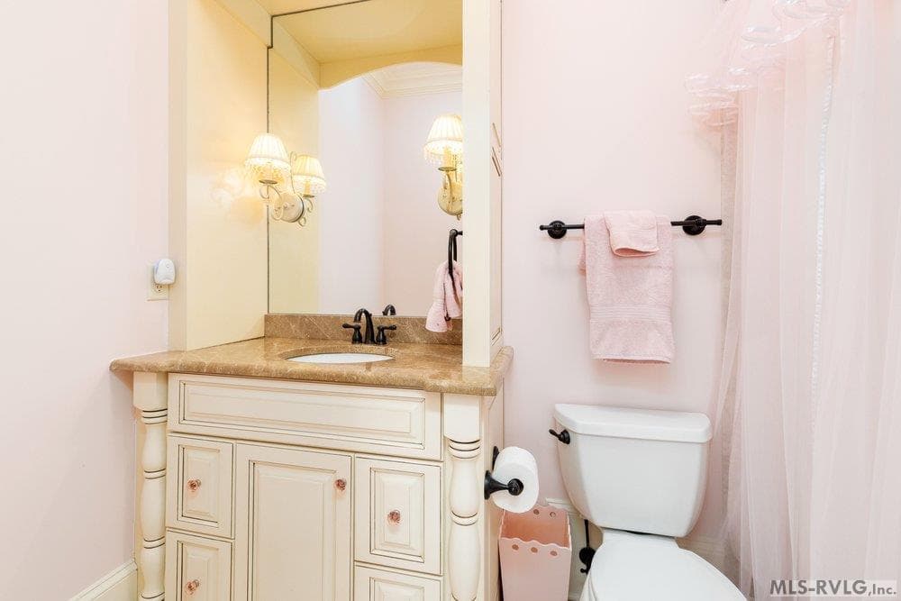 Charming Vintage-Style Bathroom, Perfect spot for a little 'me time' before heading back out to the lake. - 381 West Bend Dr., Gasburg VA 23857, Gasburg