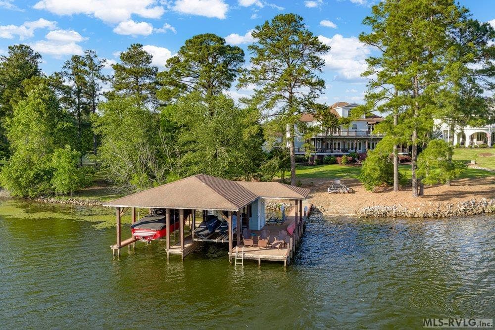 Private Double Boat House, This property also includes a third boat slip conveniently located at the community boathouse, just a short walk from home. - 381 West Bend Dr., Gasburg VA 23857, Gasburg