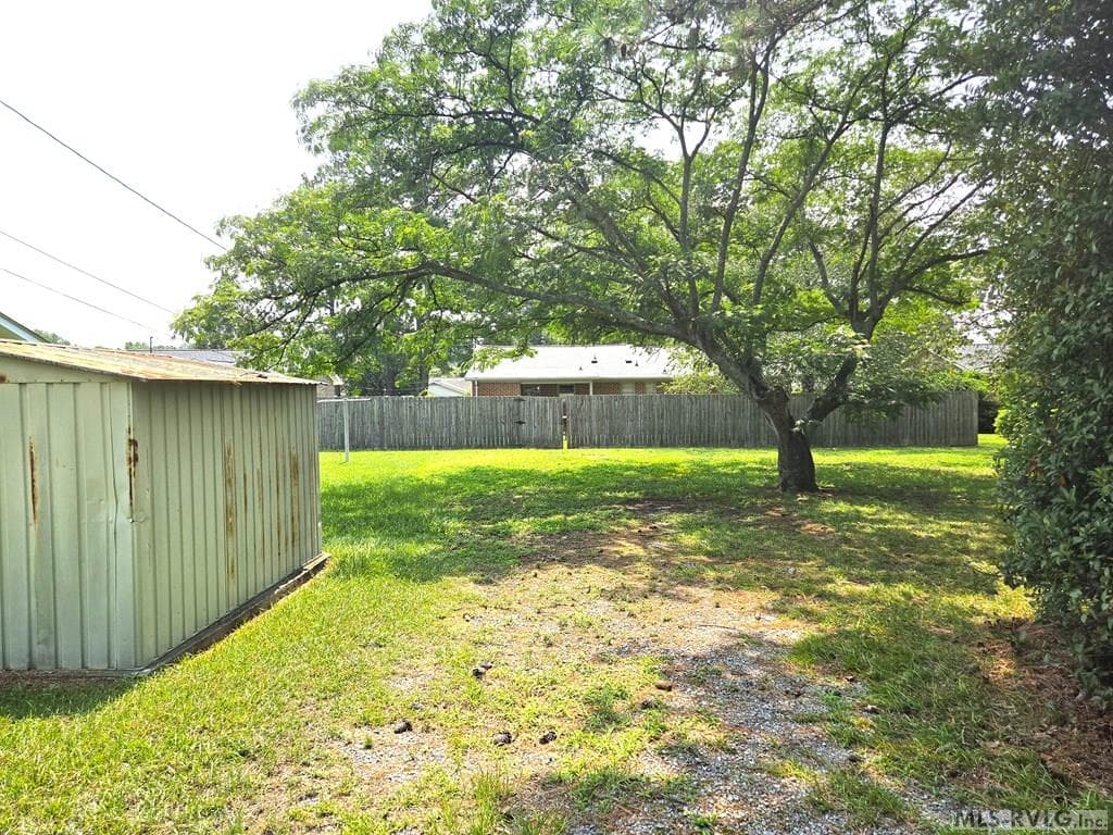 VIEW OF BACK YARD FROM ALLEY