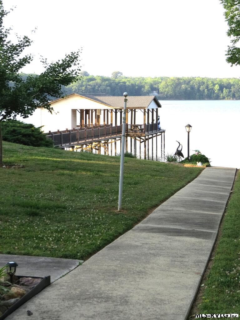CONCRETE WALK TO BOATHOUSE