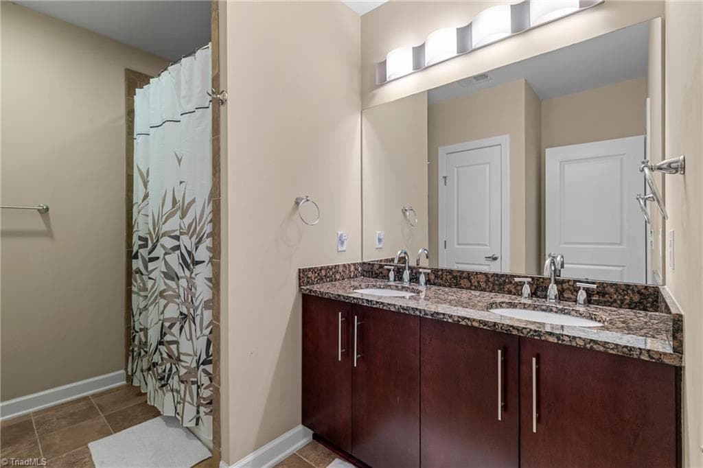 Stick/Site Built at 201 N Elm Street # 1207, Greensboro NC 27401, photo 25 of 36