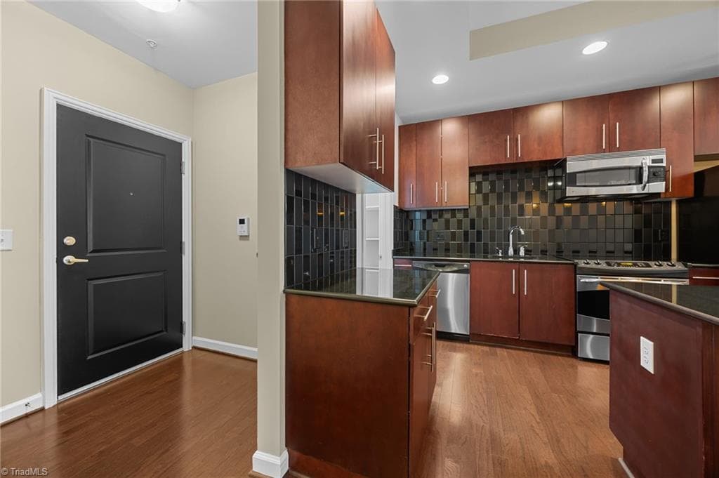 Stick/Site Built at 201 N Elm Street # 301, Greensboro NC 27401, photo 19 of 27
