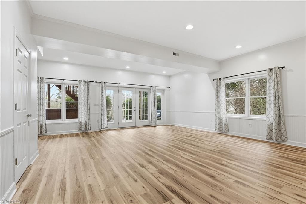 Basement offers New Paint (February 2026) along with New Vinyl plank flooring and tons of light and airy space. - 2027 Fairview Circle, Wilkesboro NC 28697, Wilkesboro