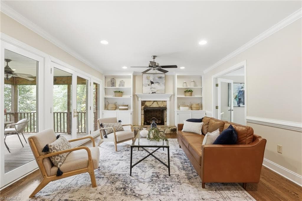 Living Room with gas logs and direct access to screen porch - 2027 Fairview Circle, Wilkesboro NC 28697, Wilkesboro