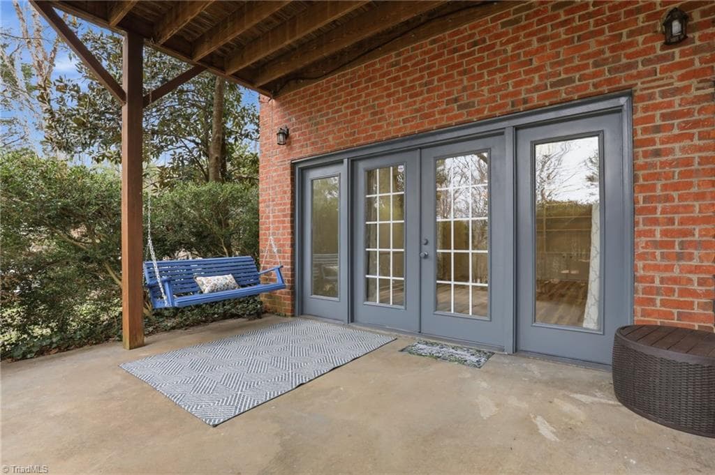Basement level patio with swing! - 2027 Fairview Circle, Wilkesboro NC 28697, Wilkesboro