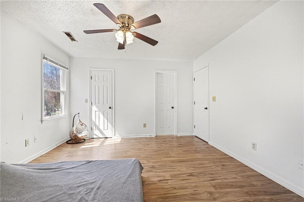 primary bedroom, closet to left, bath on right - 2326 W Vandalia Road # B, Greensboro NC 27407, Greensboro