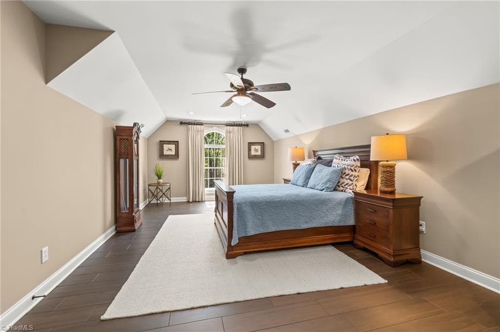 The well appointed Bonus room with ample space and storage is currently used as a bedroom suite - 11555 Double Spring Road, Lewisville NC 27023, Lewisville