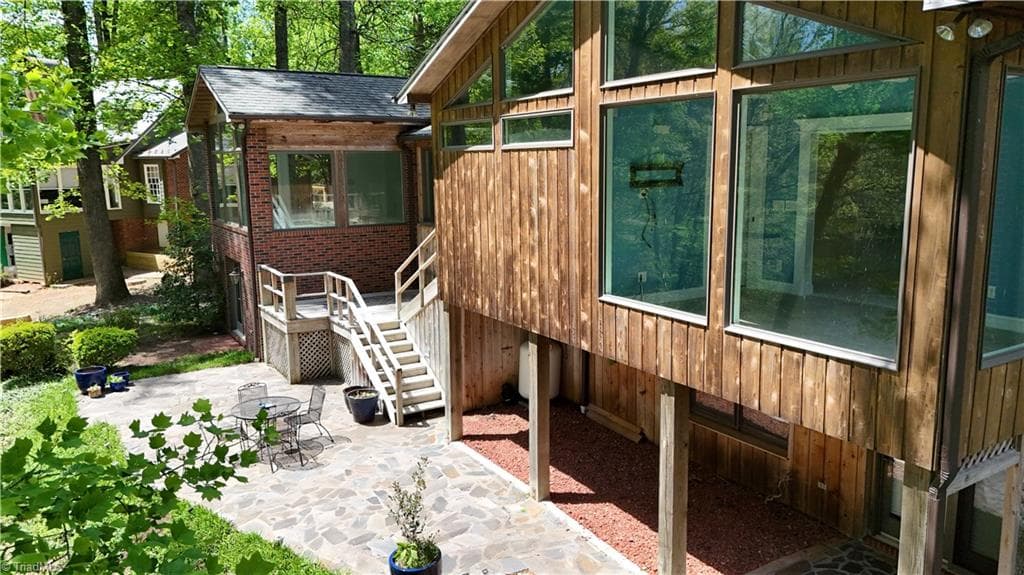 Unique home sitting on Greenhill Lake with windows, windows, windows and great views! - 700 Lakemont Trail, Mount Airy NC 27030, Mount Airy