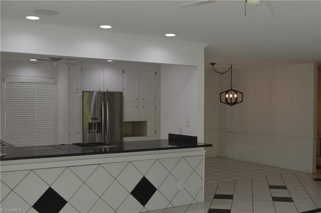 Granite countertops.  Appliances Remain. - 700 Lakemont Trail, Mount Airy NC 27030, Mount Airy