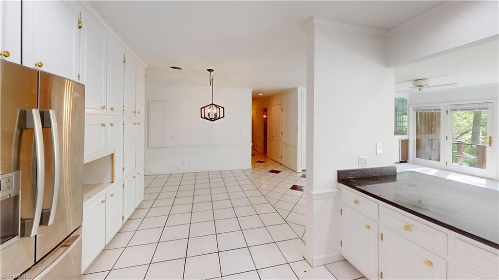 Granite countertops.  Appliances Remain. - 700 Lakemont Trail, Mount Airy NC 27030, Mount Airy