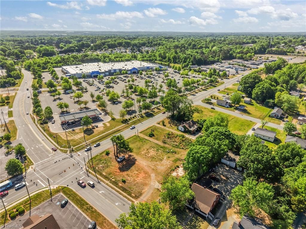 Aerial view showing the commercial lot with Walmart Supercenter across the street. - 513 S Graham Hopedale Road, Burlington NC 27217, Burlington