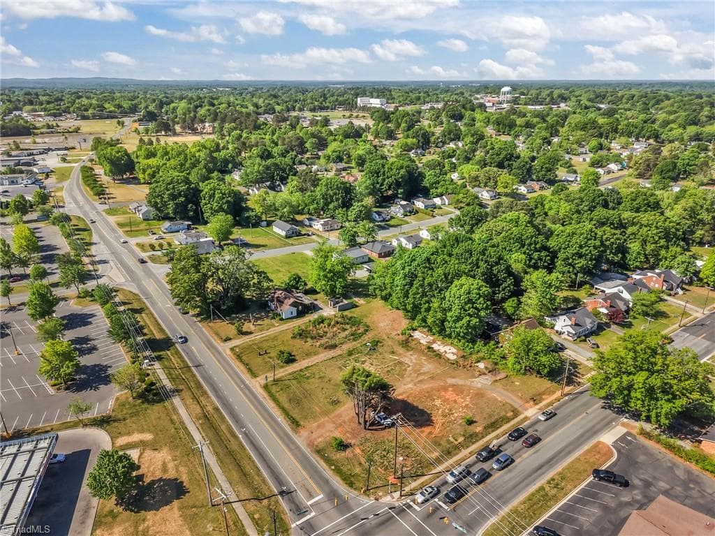 Aerial view showing the neighborhood. - 513 S Graham Hopedale Road, Burlington NC 27217, Burlington