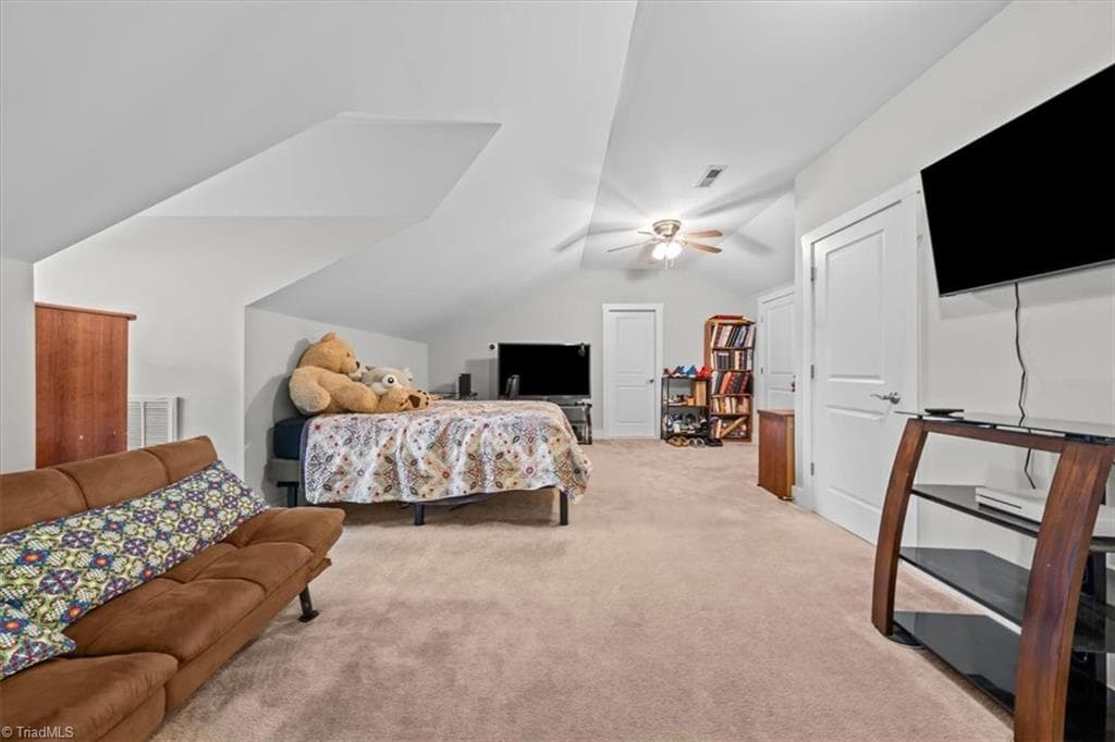 Oversized bonus room offering flexible space for guests, recreation, media, or hobbies - 2207 Sierra Trace Road, Denton NC 27239, Denton