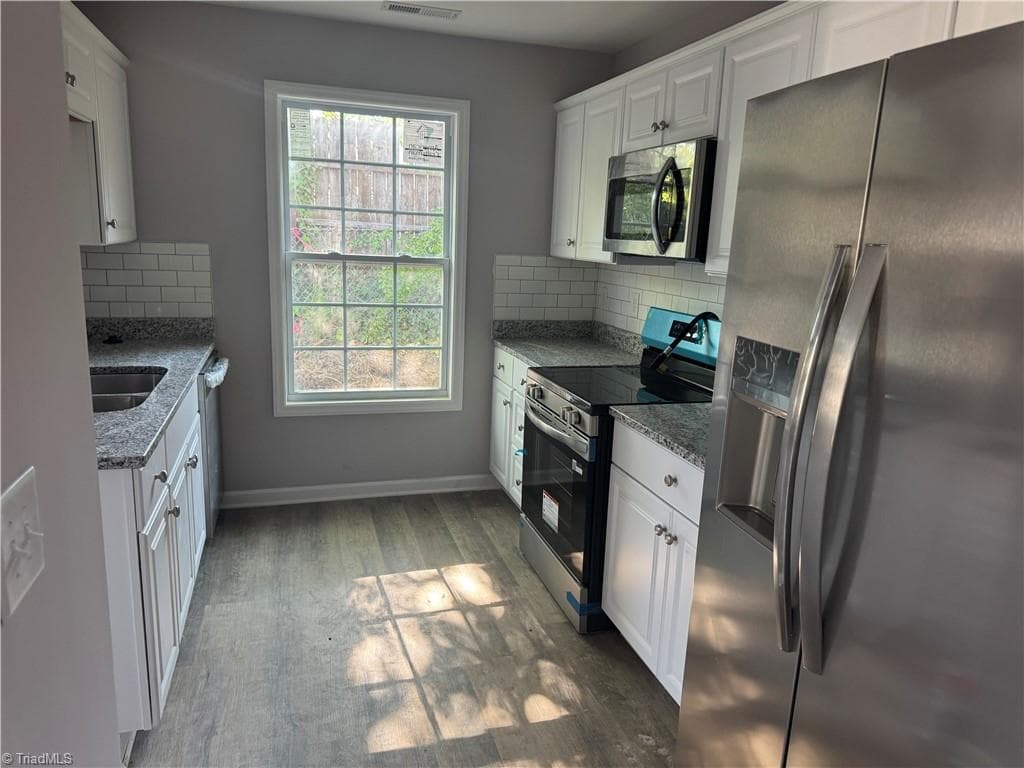 Stick/Site Built at 1003 E Russell Avenue, High Point NC 27260, photo 3 of 23