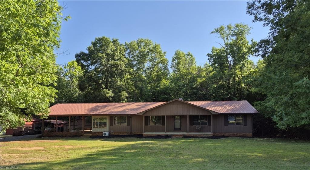 Stick/Site Built at 390 Low Water Bridge Road, Troy NC 27371, photo 2 of 41
