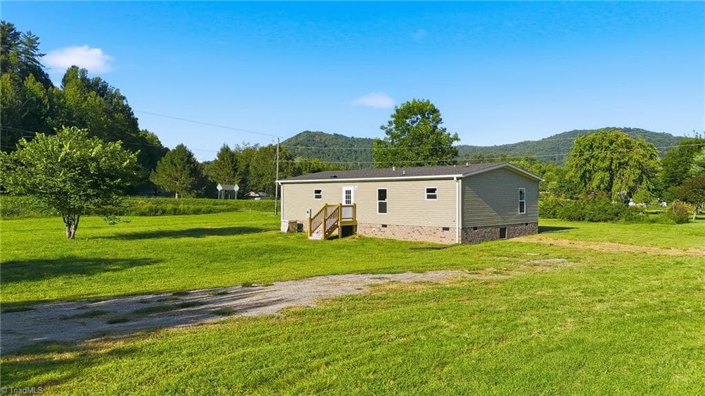 Manufactured Home at 7825 NC Highway 16, Millers Creek NC 28651, photo 5 of 41