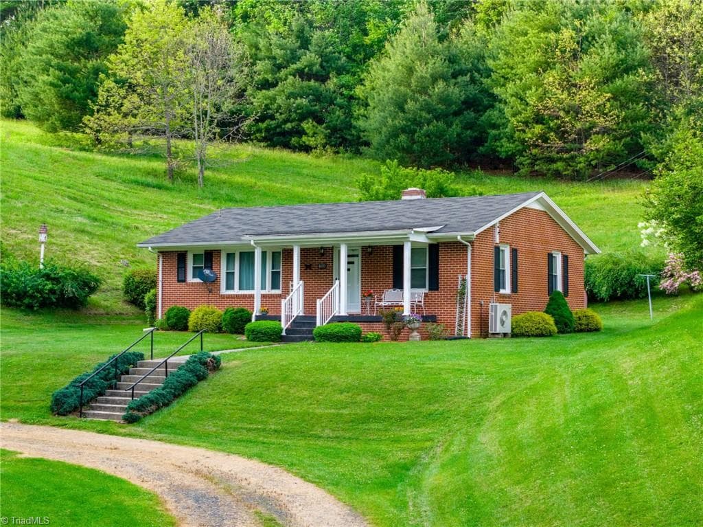 Stick/Site Built at 8693 NC Highway 88 E, Laurel Springs NC 28644, photo 2 of 44