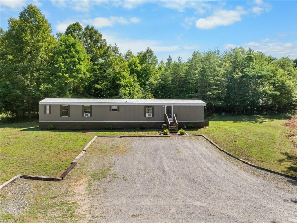 Manufactured Home at 114 Echo Hollar Road, Westfield NC 27053, photo 2 of 17