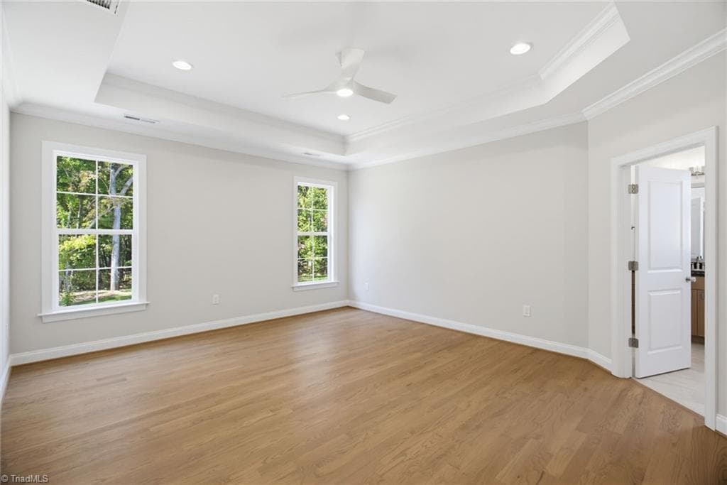 Primary bedroom 15x17 on rear of house. Tray ceiling - 4035 Estate Drive, Lewisville NC 27023, Lewisville