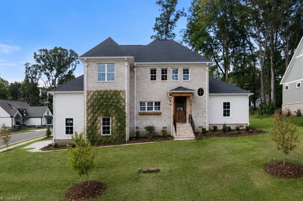 Vines on trellis and grass have been digitally added and enhanced - 8906 Maltese Court, Lewisville NC 27023, Lewisville