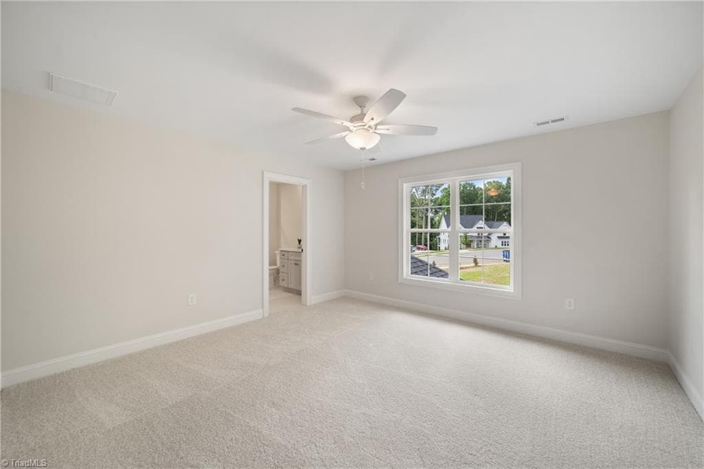 Upper Level: Bedroom 2 with En-Suite - 8906 Maltese Court, Lewisville NC 27023, Lewisville