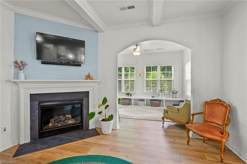 Arched doorway from living room to sunroom - 171 Brayden Drive, Advance NC 27006, Advance