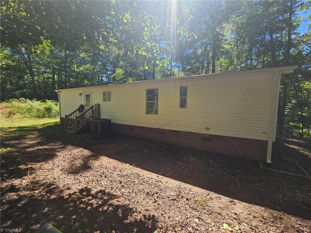 Manufactured Home at 155 Coryland Drive, Walkertown NC 27051, photo 2 of 29