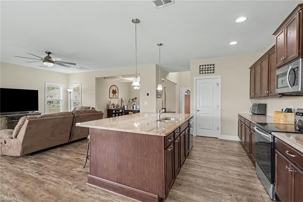 Open concept kitchen and living room. - 210 Marguerite Court, Reidsville NC 27320, Reidsville
