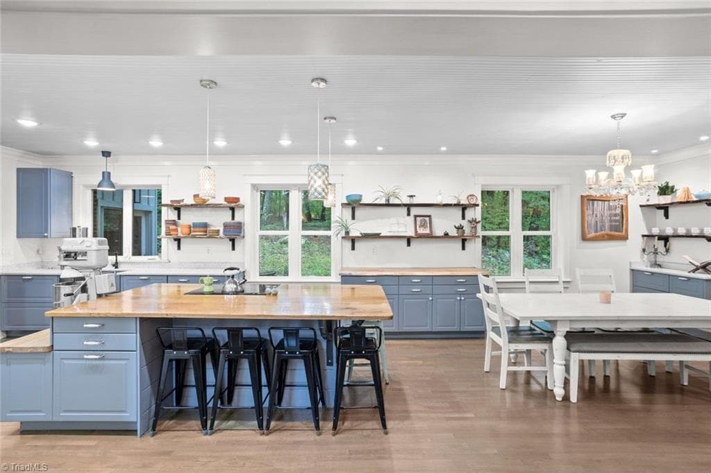 Kitchen, wood countertops and shelves all made with wood milled from the property. - 301 Carolina Avenue, Asheboro NC 27203, Asheboro