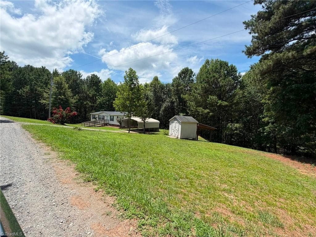 Manufactured Home at 1042 Wells Creek Road, Madison NC 27025, Madison, photo 3 of 96