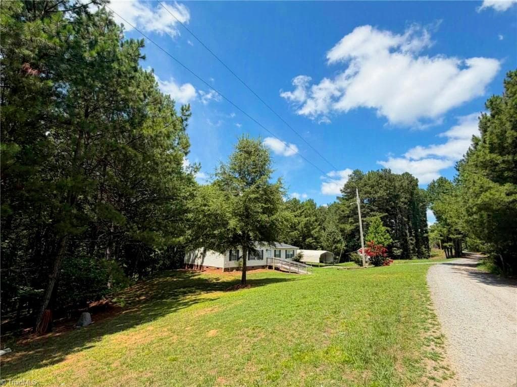Manufactured Home at 1042 Wells Creek Road, Madison NC 27025, Madison, photo 95 of 96