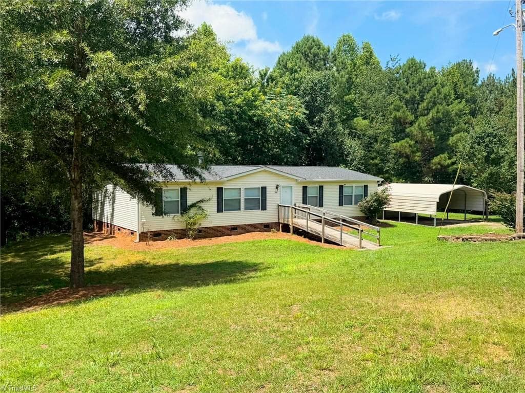 Manufactured Home at 1042 Wells Creek Road, Madison NC 27025, Madison, photo 7 of 96