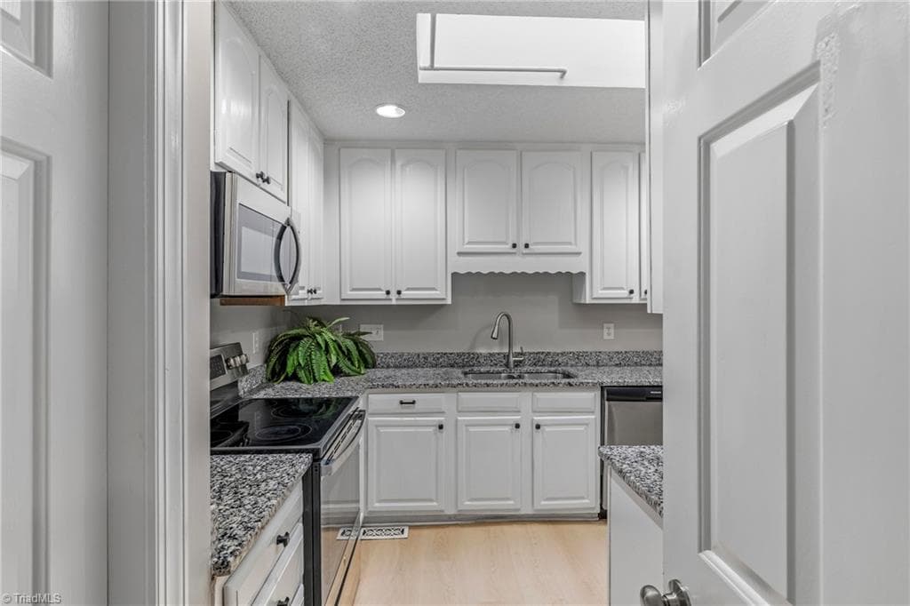 Stick/Site Built at 1955 Eastchester Drive # A, High Point NC 27265, photo 6 of 50