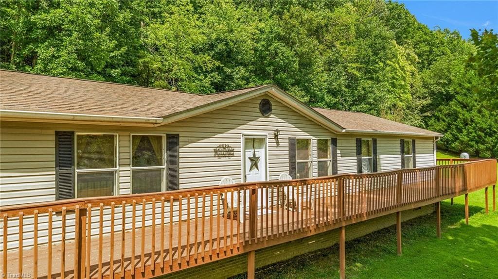 Manufactured Home at 8112 N NC Highway 16, Millers Creek NC 28651, photo 3 of 41