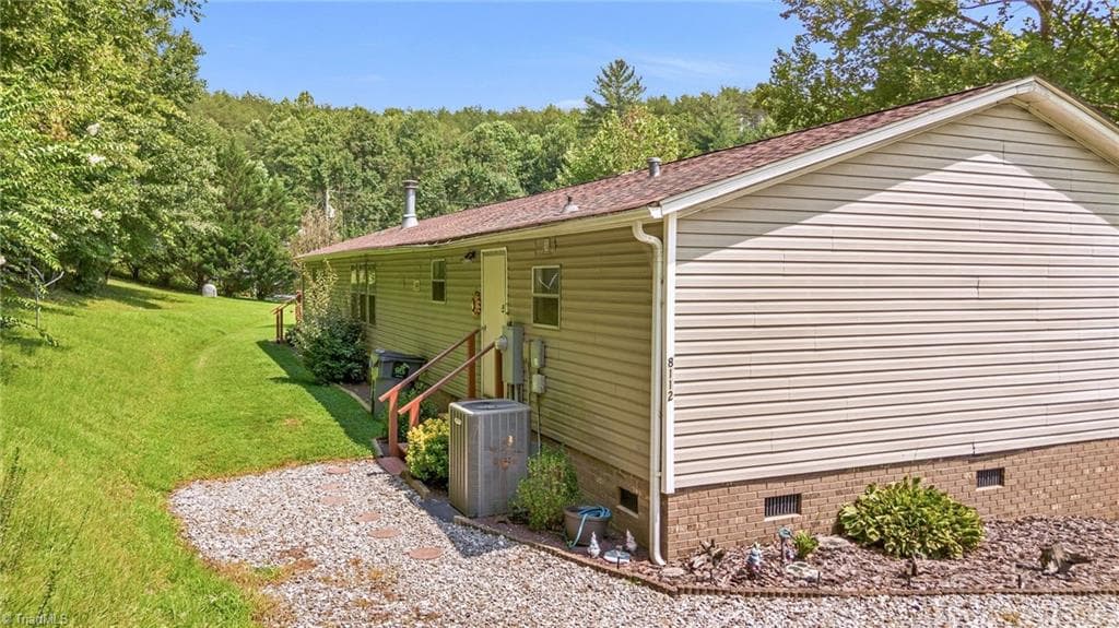 Manufactured Home at 8112 N NC Highway 16, Millers Creek NC 28651, photo 5 of 41