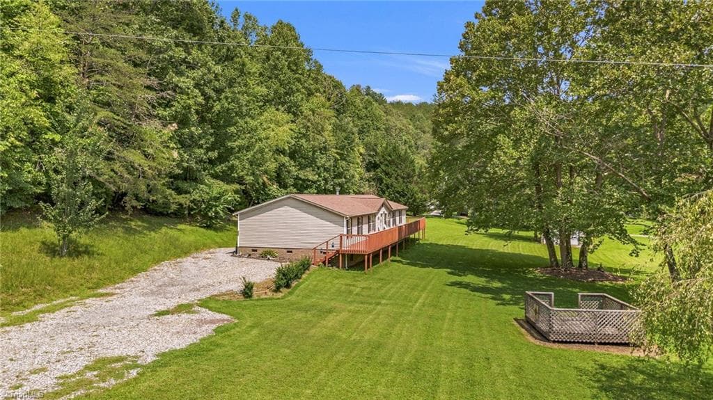 Manufactured Home at 8112 N NC Highway 16, Millers Creek NC 28651, photo 4 of 41
