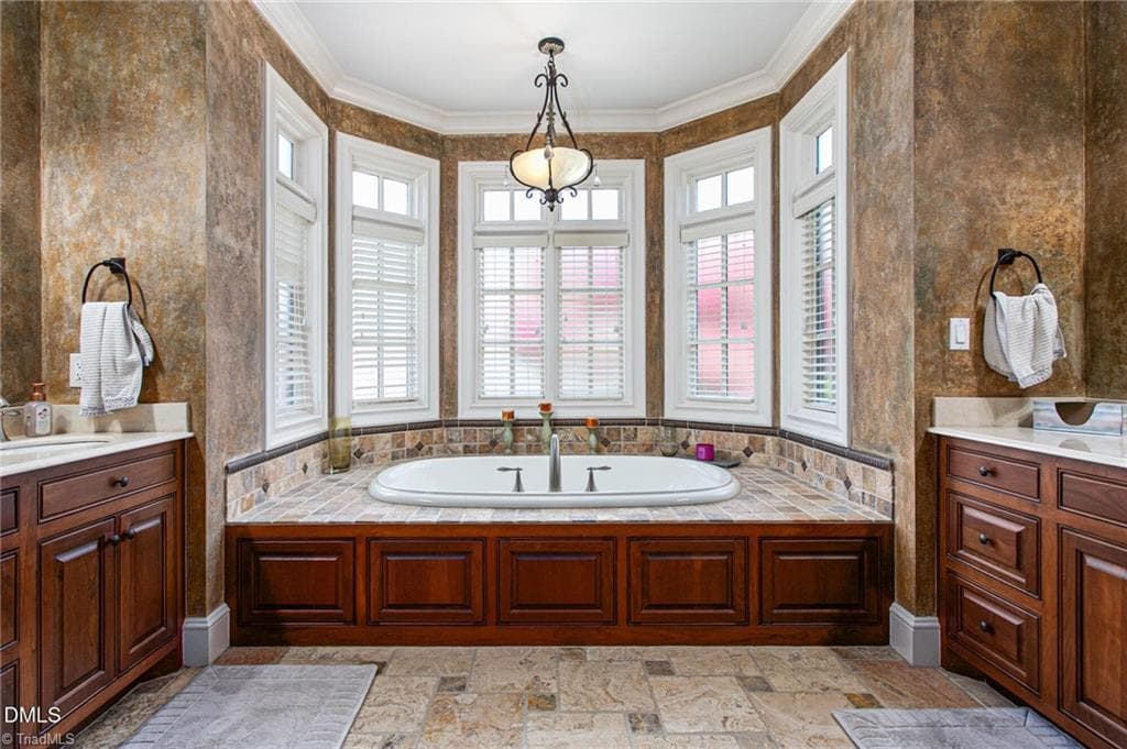 Primary bath with custom tile and cherry cabinets - 841 Dunleigh Drive, Burlington NC 27215, Burlington