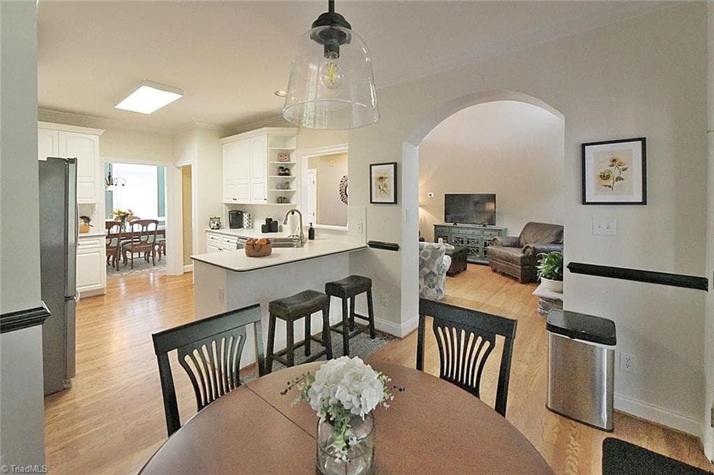 Bright and cozy breakfast room, perfect for starting the day or casual evening suppers. Thoughtfully designed for comfort and functionality. - 1101 Clyde Edgerton Drive, Kernersville NC 27284, Kernersville