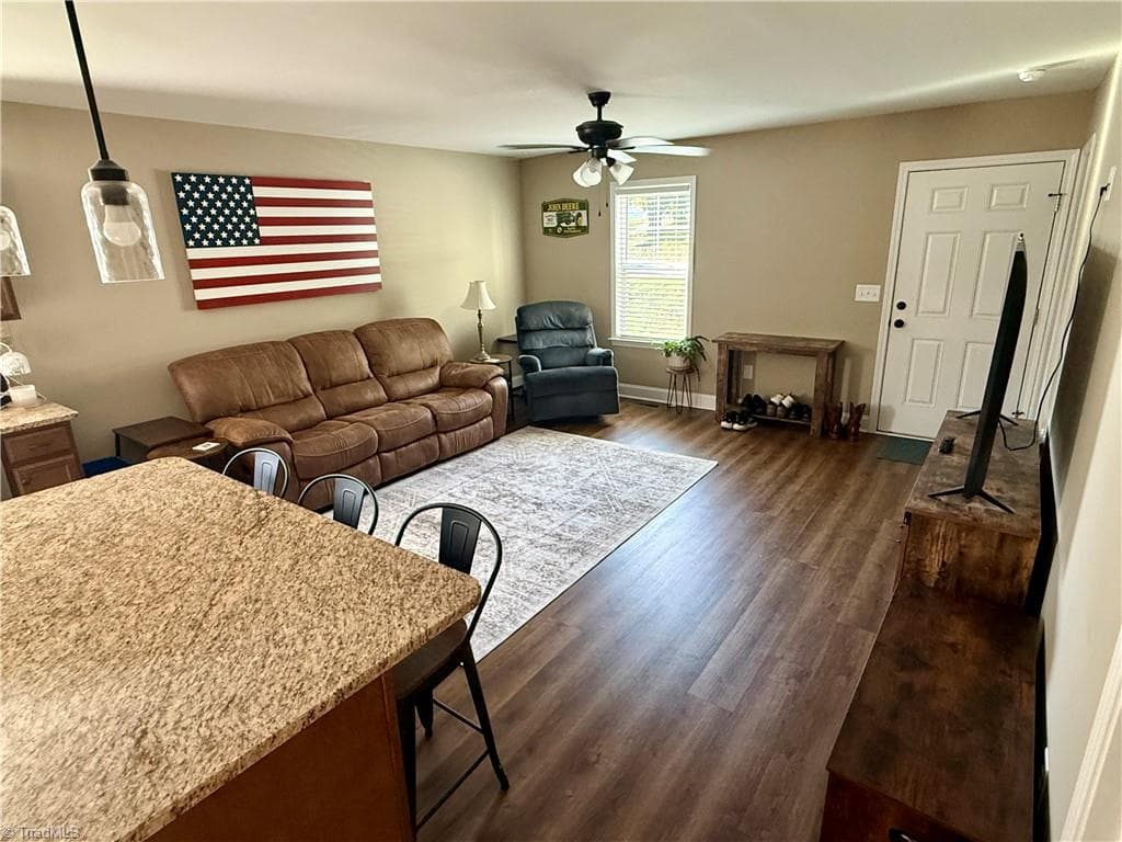 View of living room from kitchen - 104 E Gene Hairston Street, Madison NC 27025, Madison