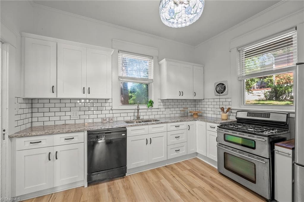 Modern kitchen remodel is a great addition to this 1920 house! - 1023 N Main Street, Mount Airy NC 27030, Mount Airy