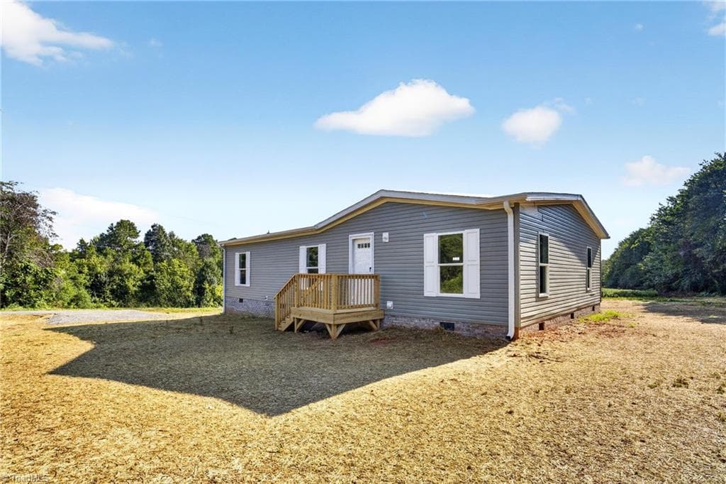 Manufactured Home at 3840 Sonnet Drive, Boonville NC 27011, photo 2 of 17