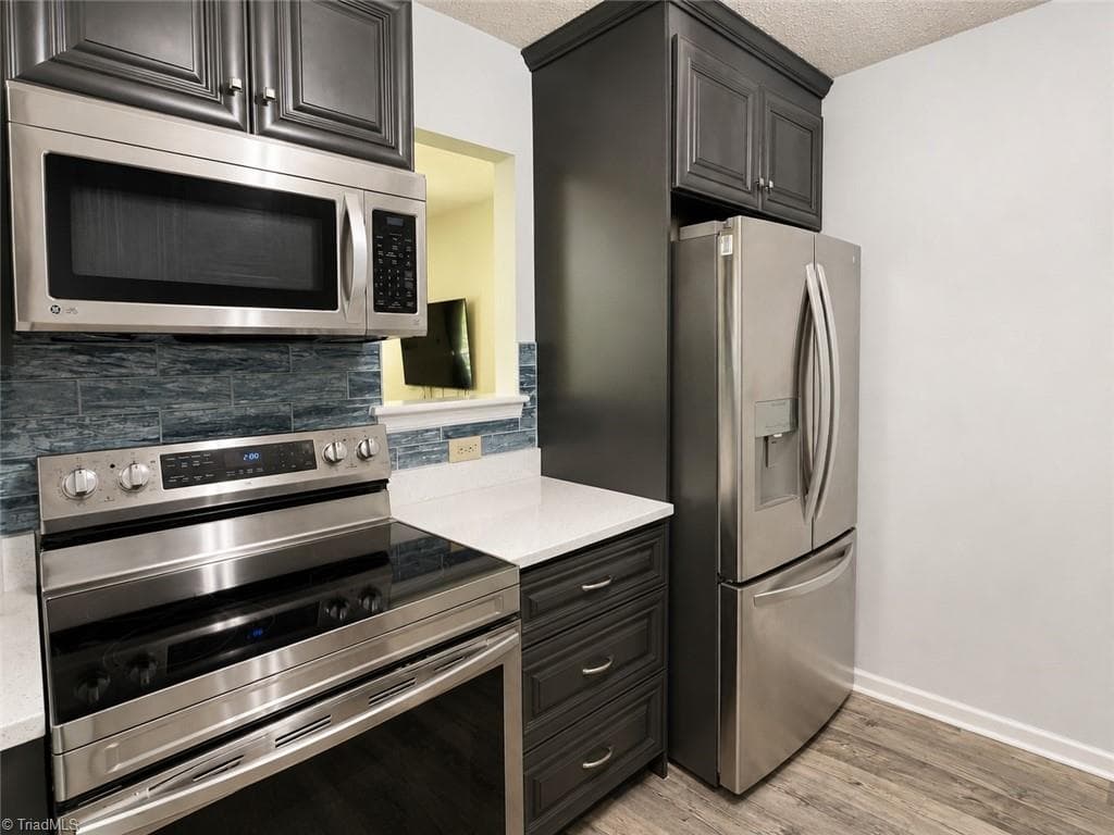 Stick/Site Built at 5519 Hornaday Road # H, Greensboro NC 27409, photo 10 of 15