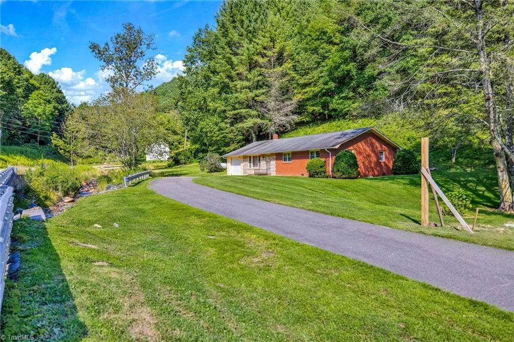 Stick/Site Built at 480 Roaring Fork Road, Creston NC 28615, photo 3 of 35