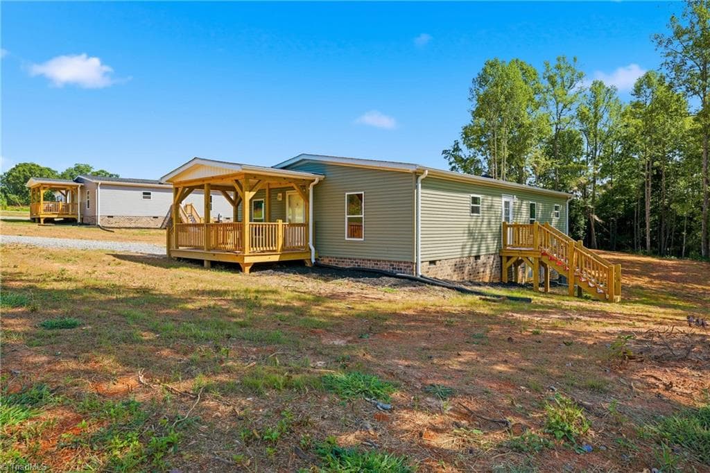 Manufactured Home at 297 Glenn Dancy Road, Hays NC 28635, photo 3 of 38