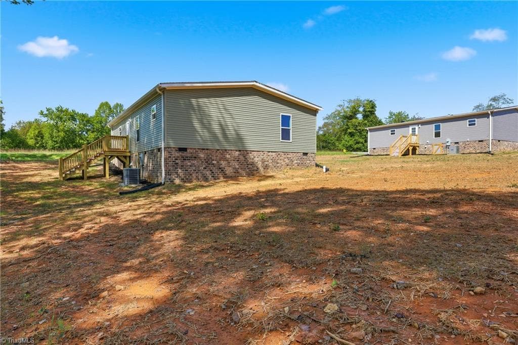 Manufactured Home at 297 Glenn Dancy Road, Hays NC 28635, photo 4 of 38