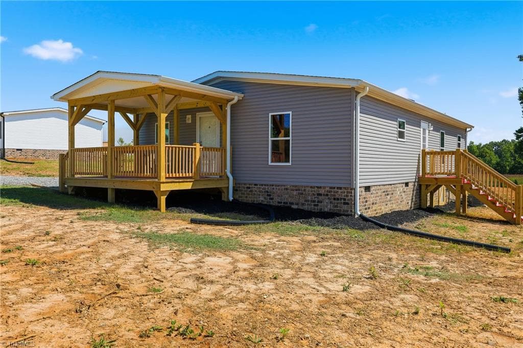 Manufactured Home at 277 Glenn Dancy Road, Hays NC 28635, photo 3 of 37