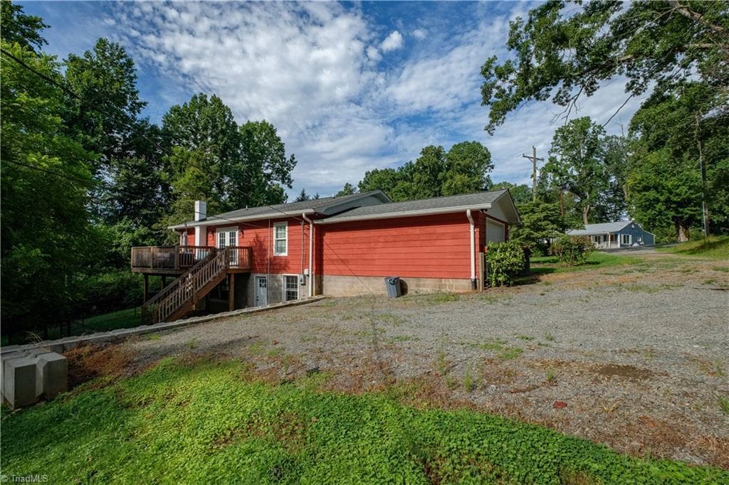 Rear view of home and driveway. Photo taken 2025 - 629 Oakland Drive, Elkin NC 28621, Elkin