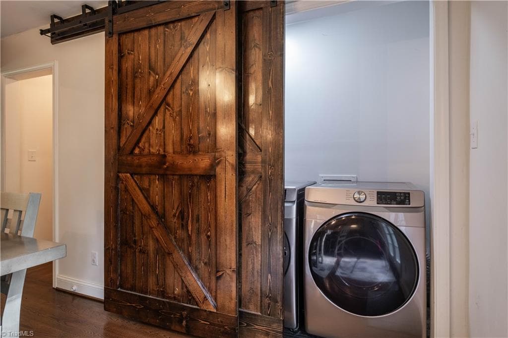 Laundry closet is conveniently located on main level. Photo taken 2025. - 629 Oakland Drive, Elkin NC 28621, Elkin